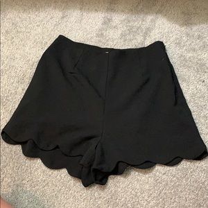 Black scallop shorts